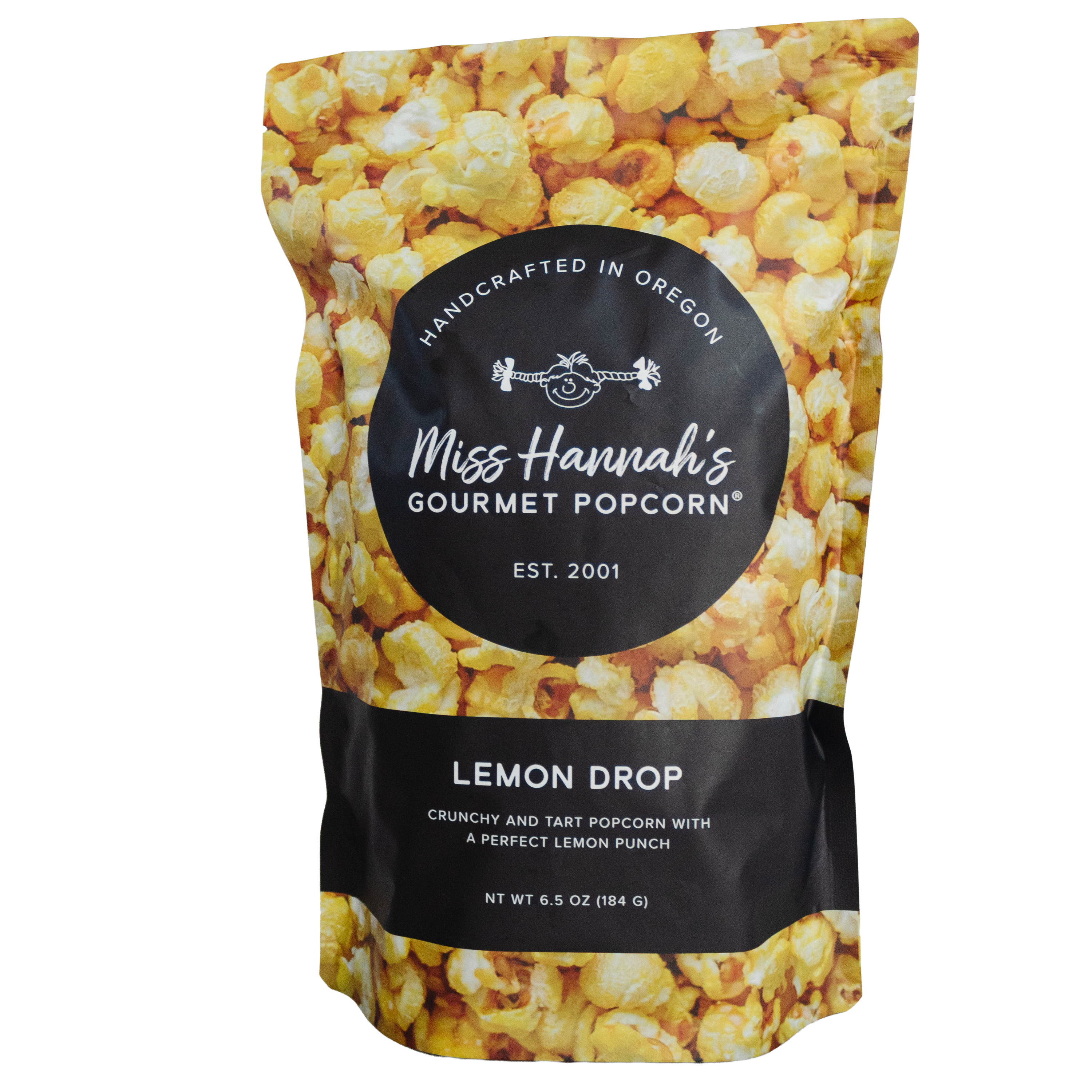 Packaged lemon drop gourmet popcorn with 'Miss Hannah's Gourmet Popcorn' label on a black background